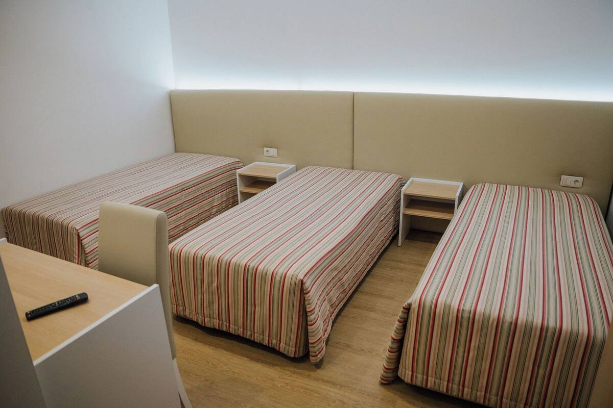 Standard Triple Room, 3 Twin Beds, Non Smoking, Private Bathroom | Desk, laptop workspace, blackout drapes, soundproofing