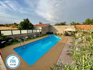 Seasonal outdoor pool, open 9:00 AM to midnight, free cabanas