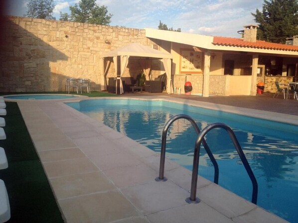 Seasonal outdoor pool, open 9:00 AM to midnight, free cabanas