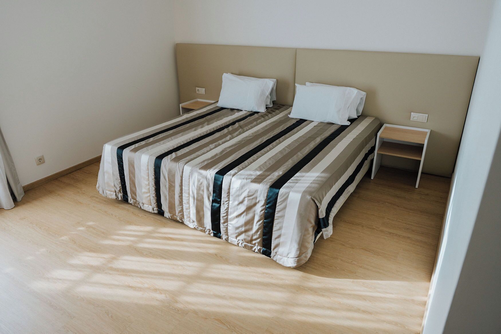 Desk, laptop workspace, blackout drapes, soundproofing