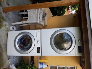 Washers are installed side by side in this compact outdoor unit.