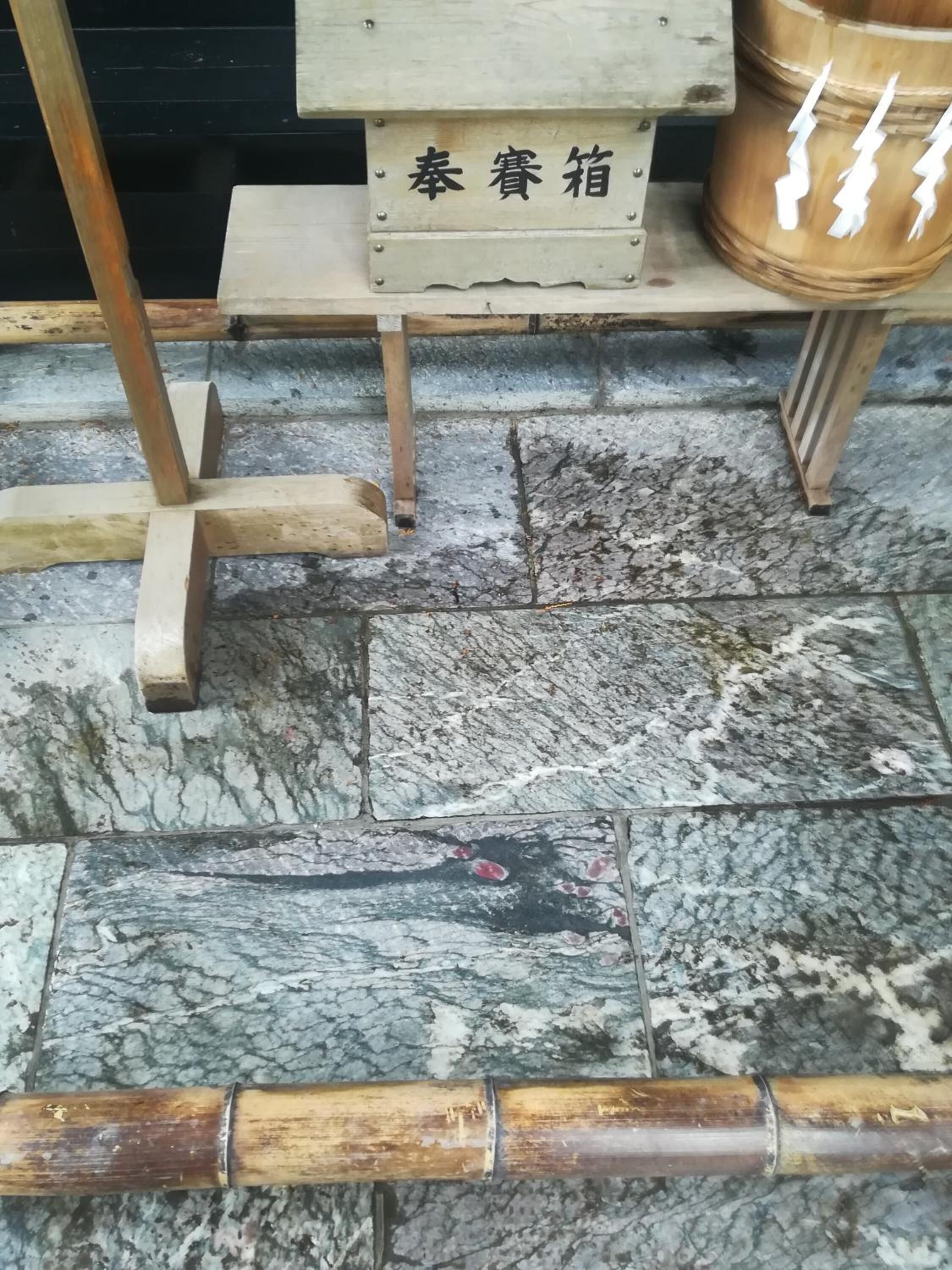A wooden staircase with a sign above it.