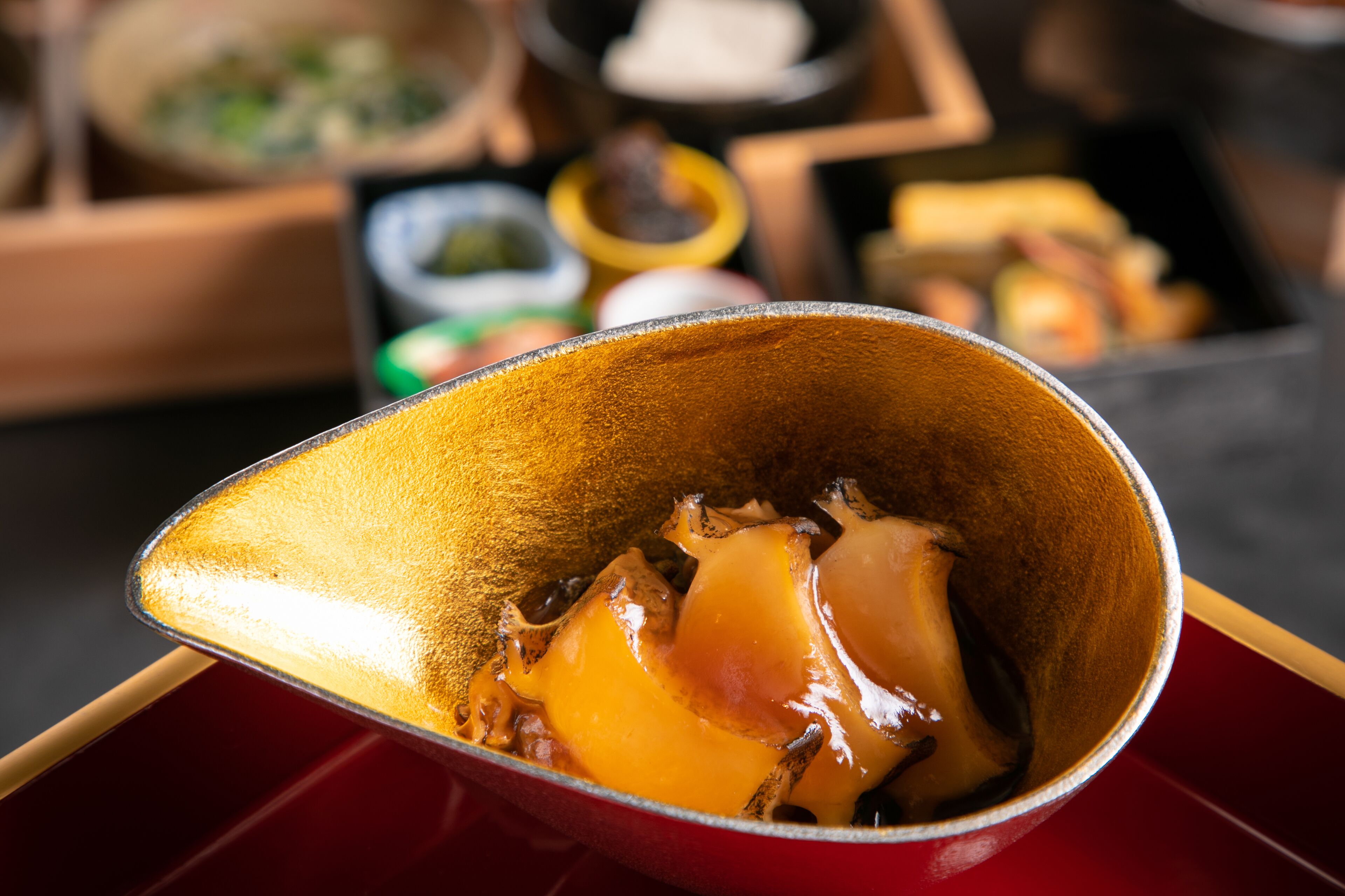 A close-up of a traditional Japanese dish in a ceramic bowl.
