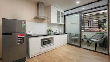 Departamento superior | 1 habitación, caja de seguridad en la habitación y escritorio