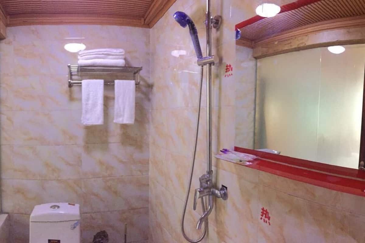 Shower, free toiletries, hair dryer, slippers