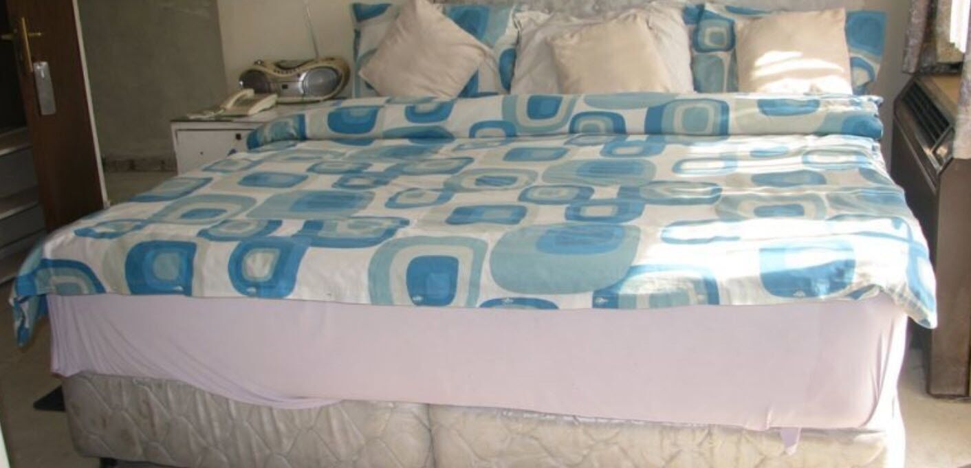 Desk, laptop workspace, free WiFi, bed sheets