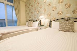 Blackout curtains, rollaway beds, free WiFi, bed sheets