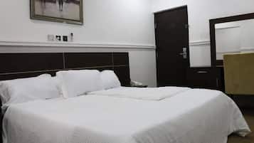 Habitación clásica | Escritorio, wifi gratis y ropa de cama