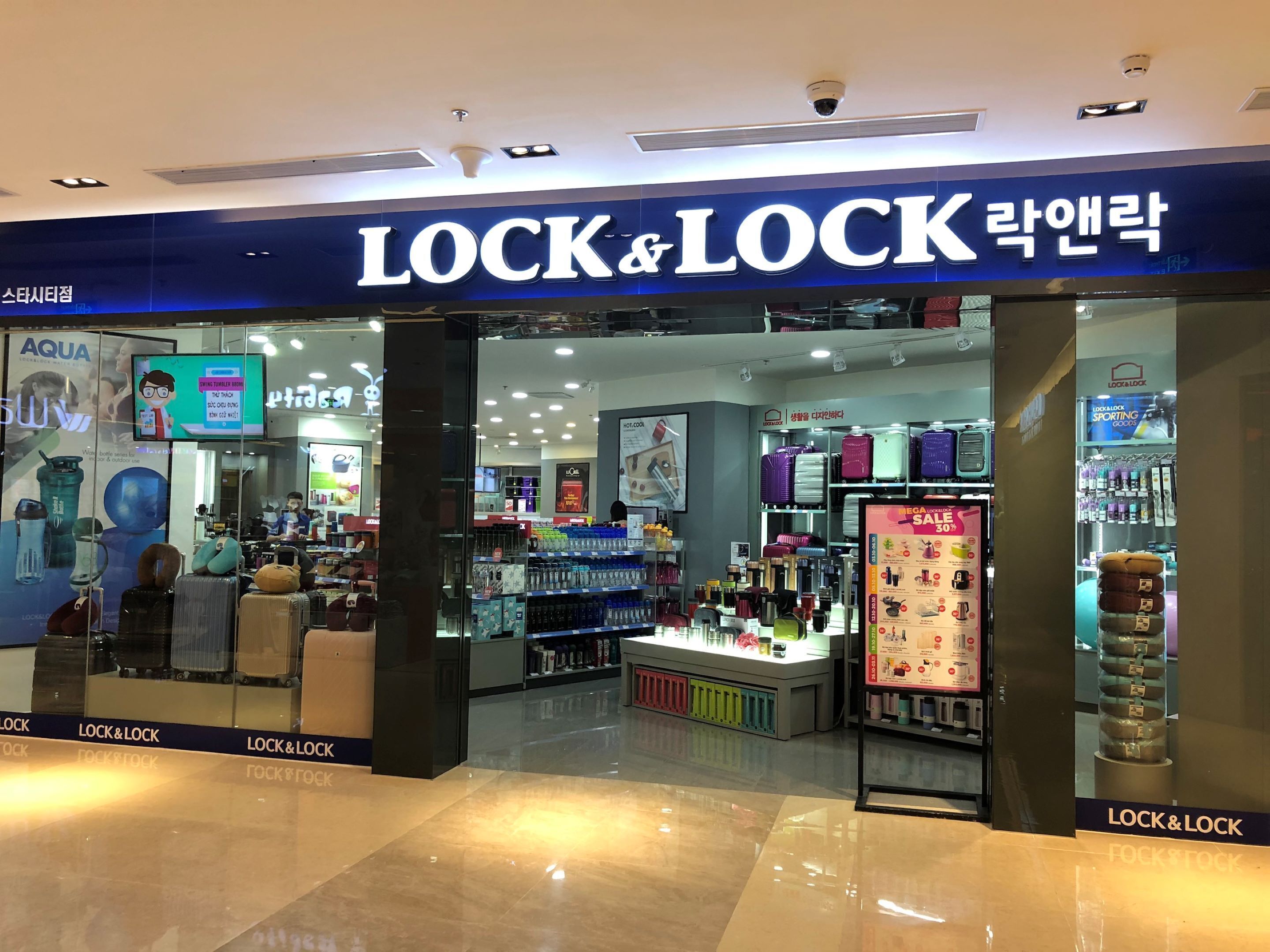 A LOCK&LOCK store with a variety of luggage and travel accessories.