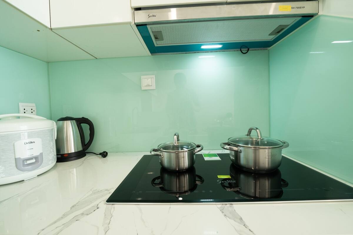 fridge, microwave, stovetop, electric kettle