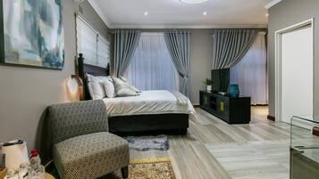 In-room safe, desk, laptop workspace, iron/ironing board