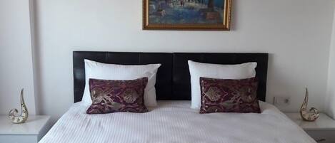 Deluxe Apartment (2+1) | Premium bedding, desk, laptop workspace, blackout curtains