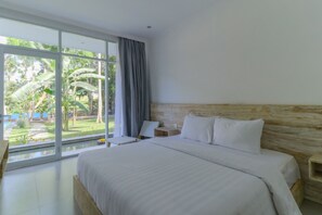 Habitación doble Deluxe | Escritorio, wifi gratis y ropa de cama