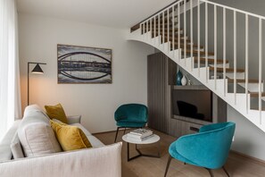 Family Duplex | Living room | 107-cm Smart TV with satellite channels, TV - The Central City - Luxury ApartHotel (Luxembourg City)