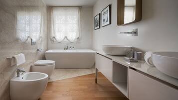 Villa | Bathroom | Separate bathtub and shower, hair dryer, towels, soap