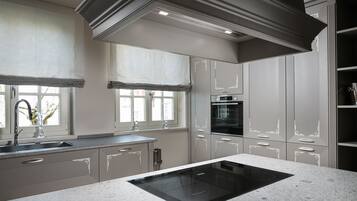 Villa | Private kitchen | Full-size fridge, oven, stovetop, dishwasher