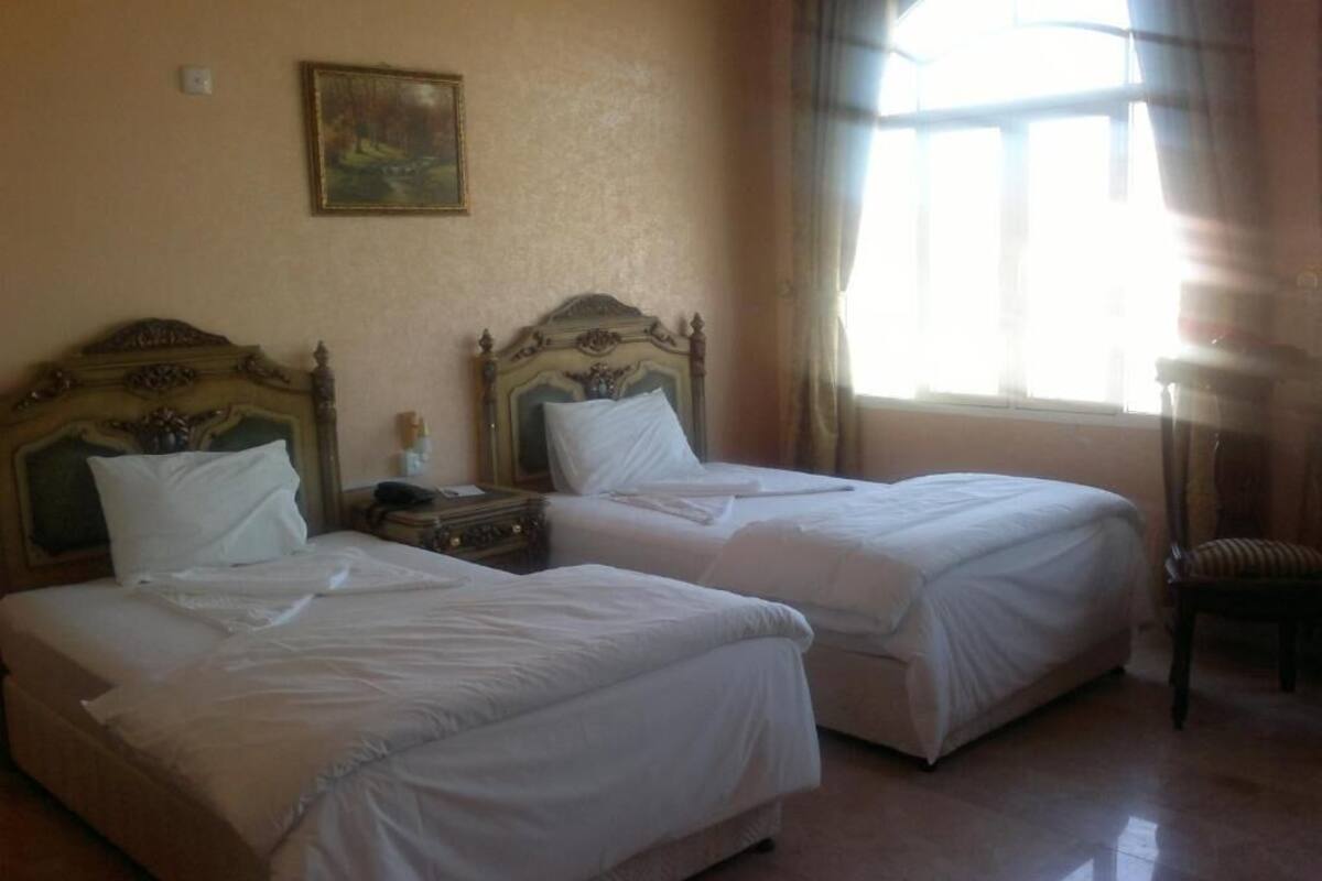 Twin Room | 1 bedroom, iron/ironing board, free WiFi, bed sheets