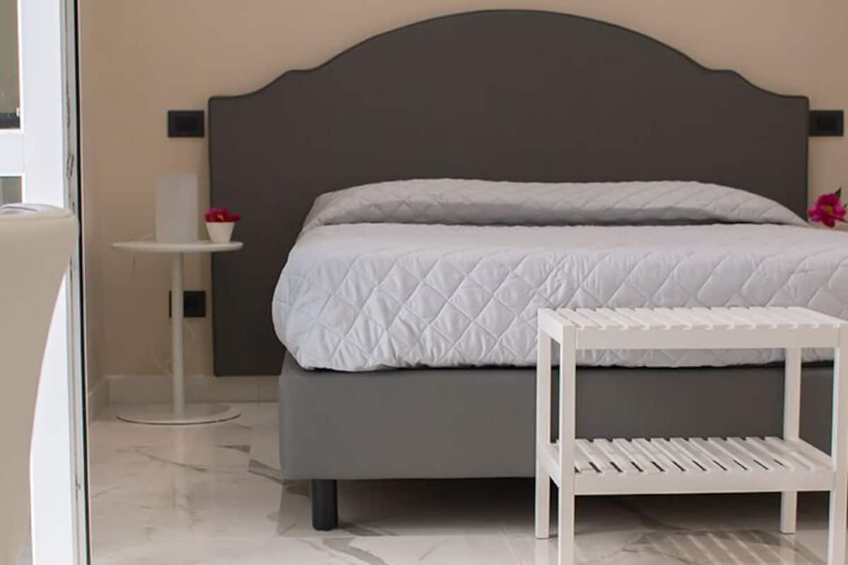 Superior Double Room, Balcony | In-room safe, desk, laptop workspace, blackout drapes