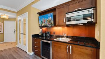 Fridge, microwave, stovetop, coffee/tea maker