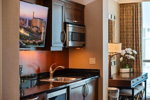 Fridge, microwave, stovetop, coffee/tea maker