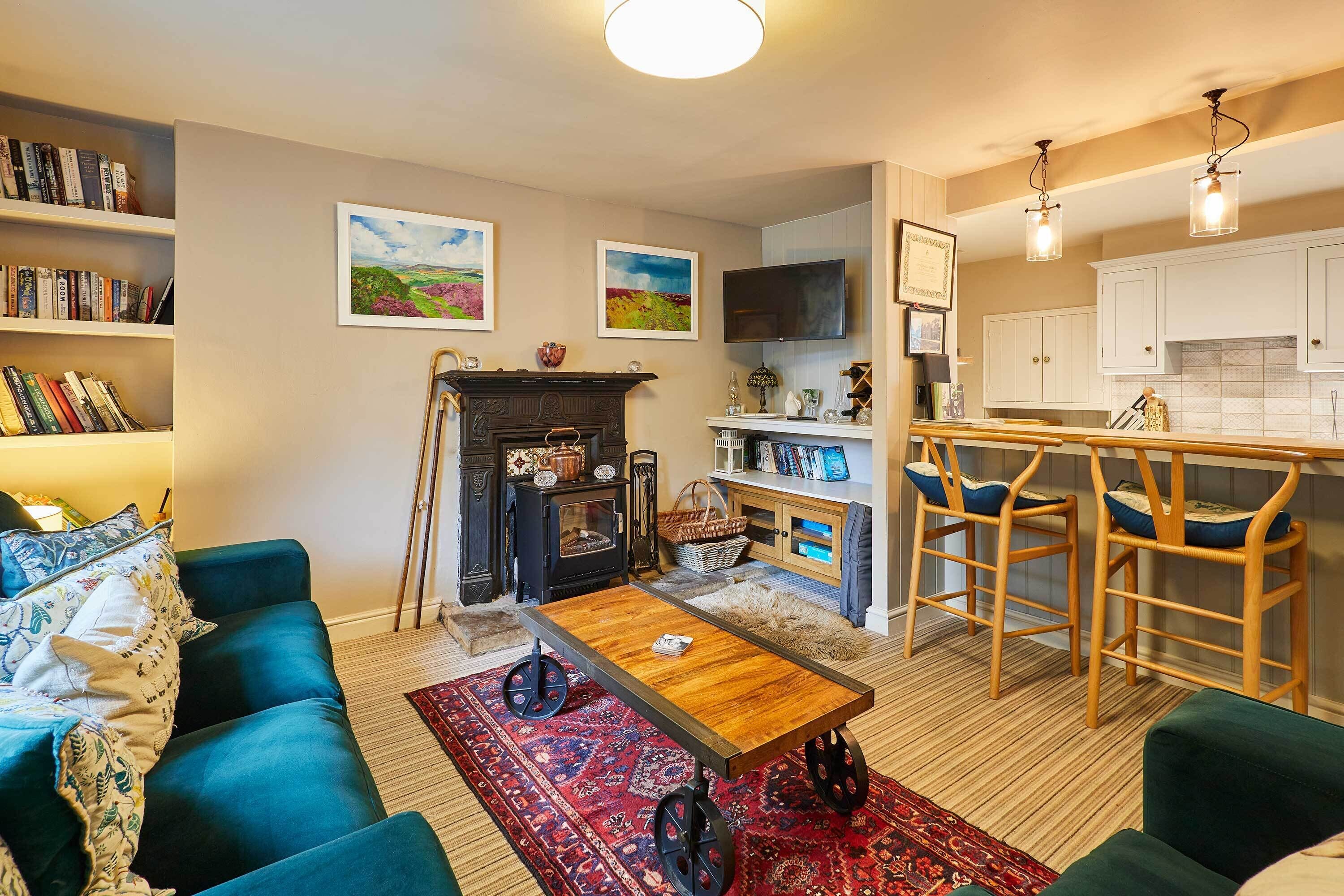 Flat-screen TV, books, offices