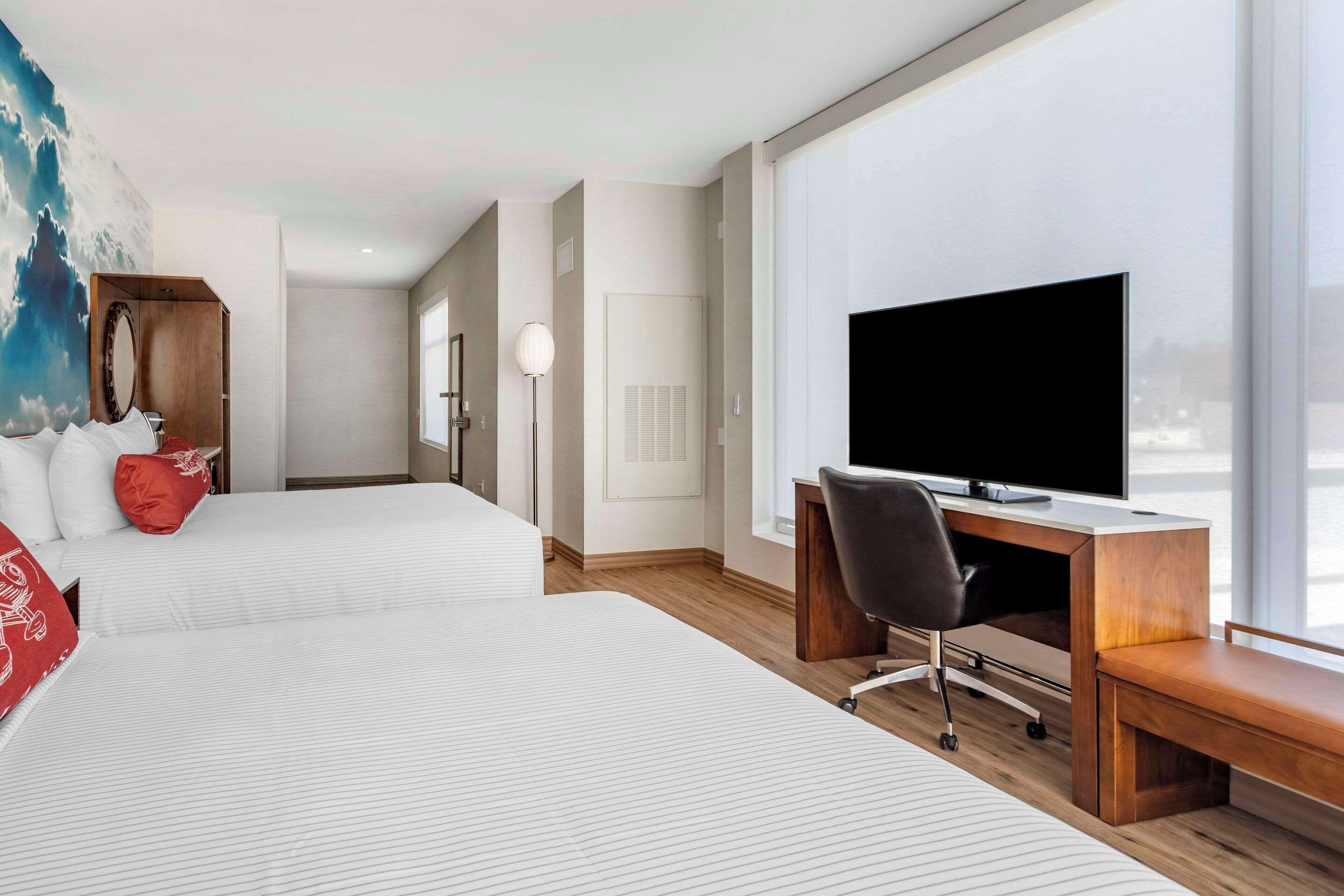 Premium bedding, pillow-top beds, desk, free cots/infant beds