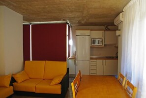 Bungalow | Sala de estar | Televisión 