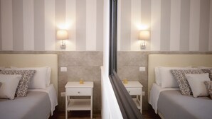 Rom – deluxe | Sengetøy av topp kvalitet, dundyner, memory foam-senger og minibar