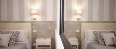 Deluxe Room | Premium bedding, down comforters, memory foam beds, minibar