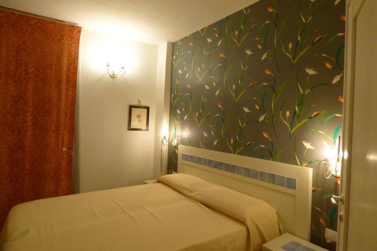 Habitación Deluxe con 1 cama matrimonial o 2 individuales | Sábanas italianas Frette, ropa de cama de alta calidad y edredón