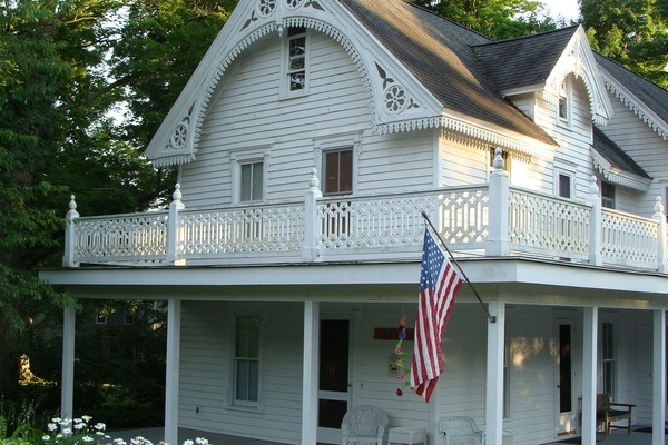 Carpenter Gothic style architecture...horseshoe gingerbread trim