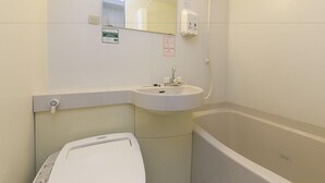 A bathroom with a sink, mirror, and bathtub. - R&B Morioka-ekimae (Morioka)
