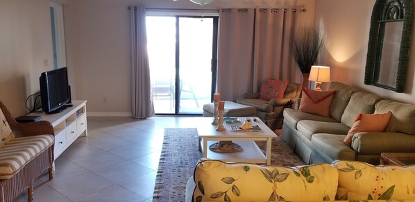 Condo, Multiple Beds, Patio, Pool View | Living area | 42-inch TV with cable channels