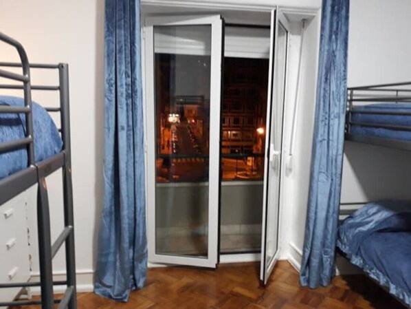 Family Quadruple Room, Shared Bathroom (Azul) | Individually decorated, individually furnished, laptop workspace - Ameli Rooms (Lisbon)