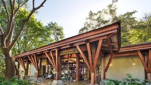 A nature center with a wooden pavilion, stone seating, and a checkered floor. - Oceanview Escape in Peninsula Papagayo – Pool, Concierge & Resort Access (Peninsula Papagayo)