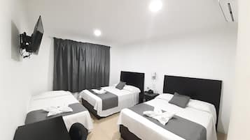 Superior Triple Room | Blackout curtains, iron/ironing board, free WiFi, bed sheets