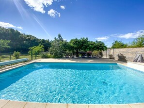 Outdoor pool, a heated pool, pool umbrellas, sun loungers