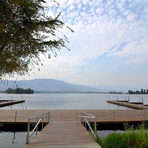 Enjoy serene lakeside views from the wooden pier, perfect for relaxation or outdoor activities.