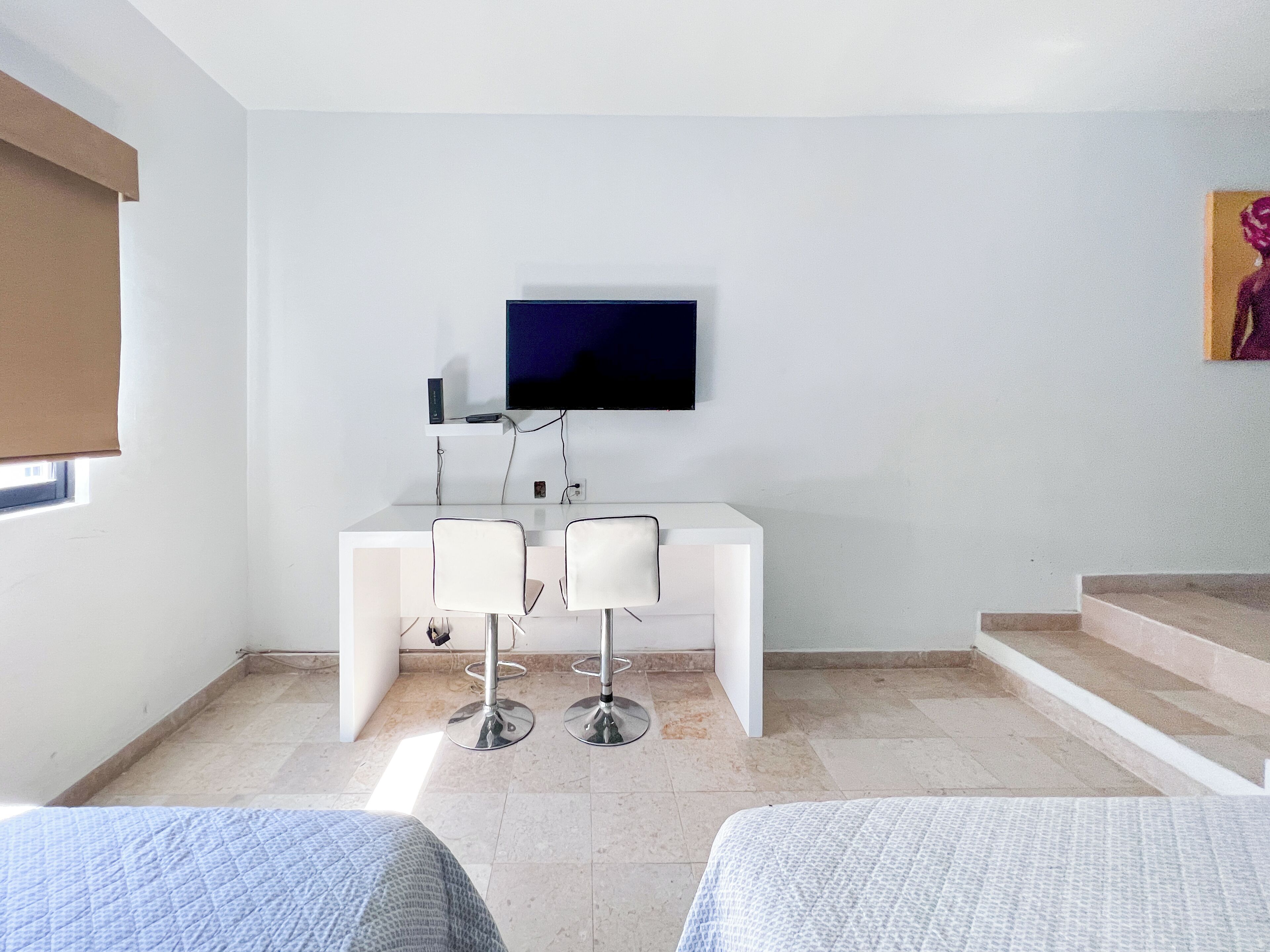 Habitación junior | Camas Select Comfort, tabla de planchar con plancha y wifi gratis 