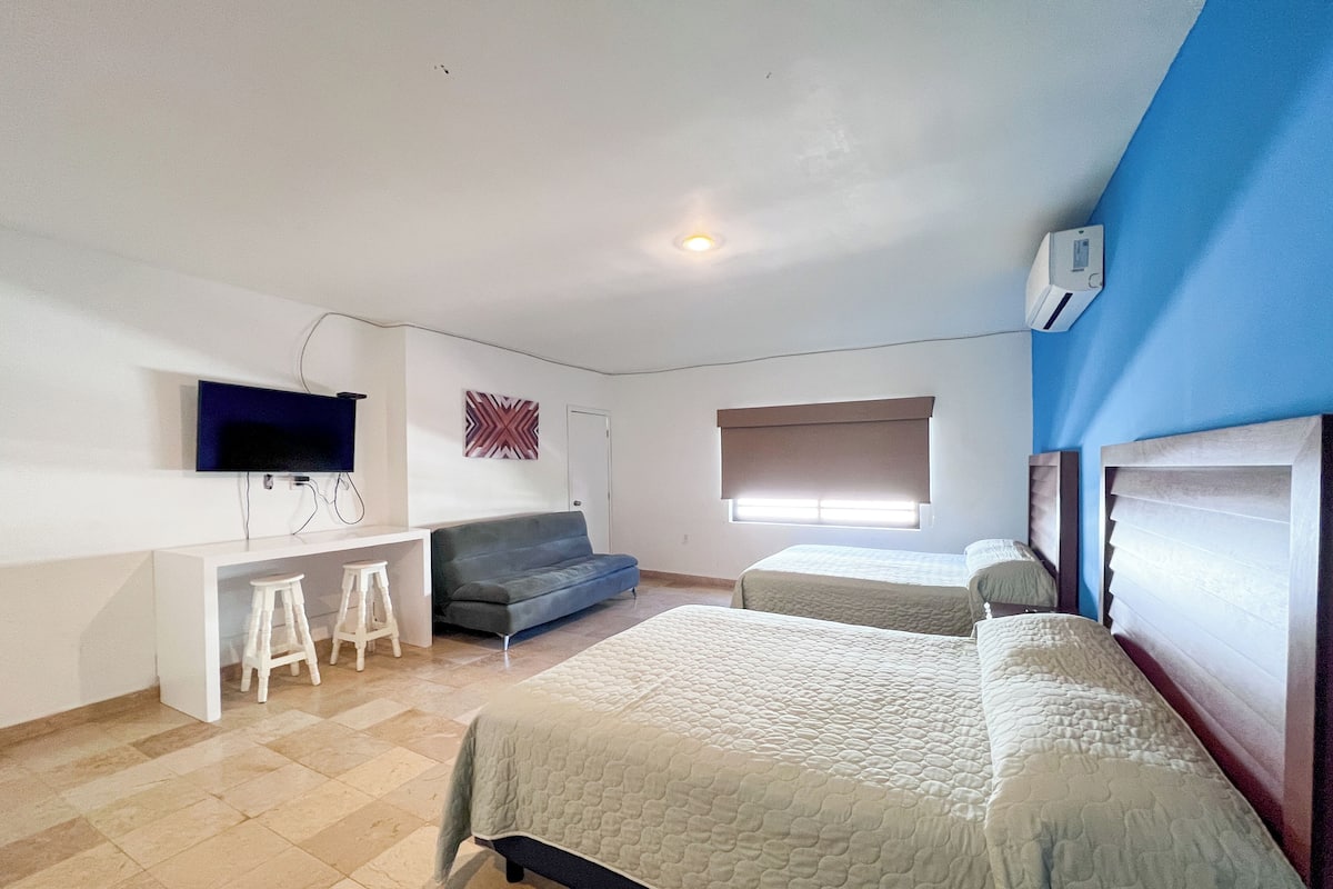 Habitación económica | Colchones Select Comfort, tabla de planchar con plancha, wifi gratis