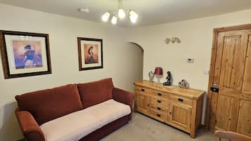 Cottage Supérieur, salle de bains attenante | Bar lounge