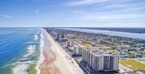 On the beach, sun loungers, beach towels