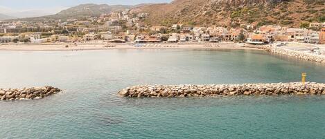 On the beach, sun-loungers, beach towels