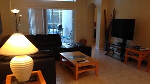 Villa | Living room | Flat-screen TV, DVD player - Indian Pointe 5 bed / 3 Bath Home (Kissimmee)