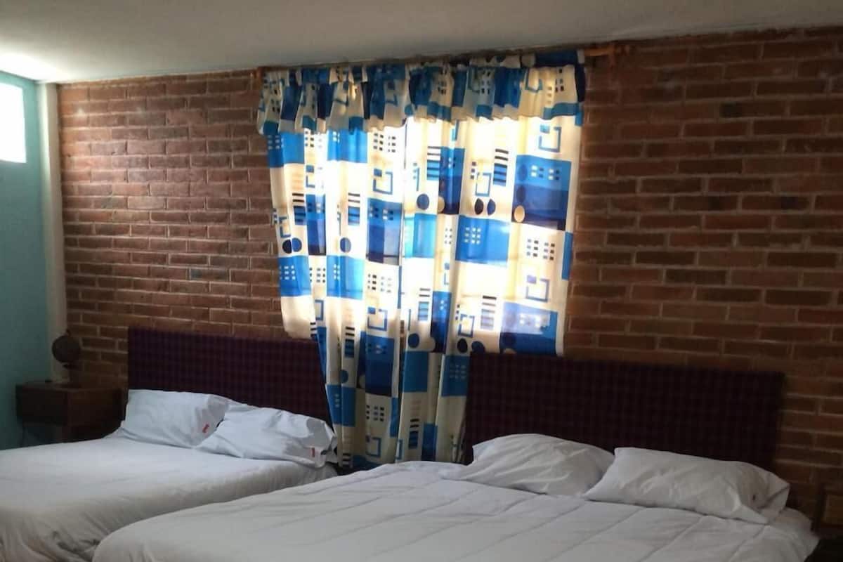 Basic Quadruple Room (1 King Bed and 1 Double Bed #1) | 1 bedroom, free WiFi, bed sheets