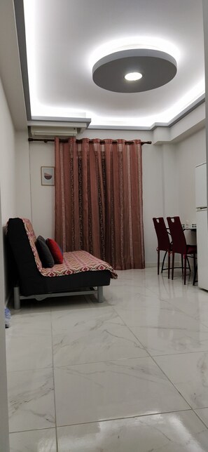 Classic Apartment (A2) | Living room | 20-inch plasma TV with digital channels, TV - SeaSide Apartment Rio (Patras)