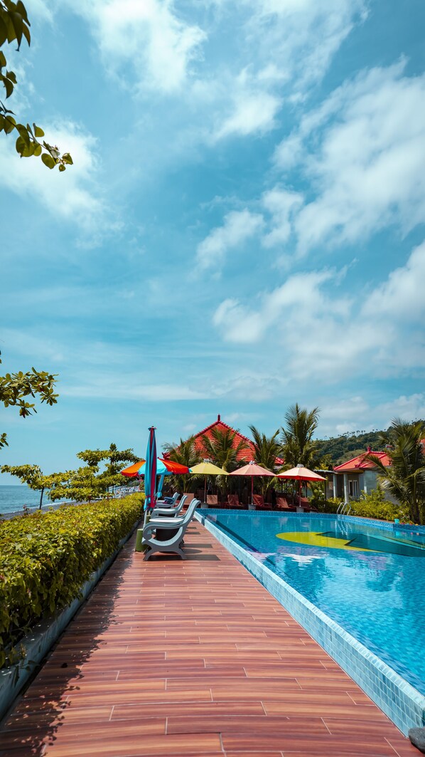 Outdoor pool, open 7:30 AM to 7:00 PM, sun loungers