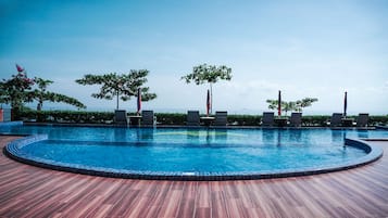 Outdoor pool, open 7:30 AM to 7:00 PM, pool loungers
