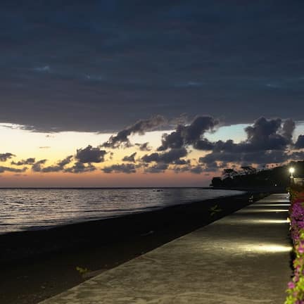 On the beach, black sand