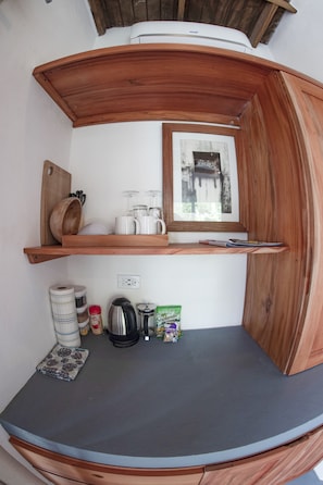 Enjoy cooking in this well-equipped kitchen with oven, kettle, and coffee maker.